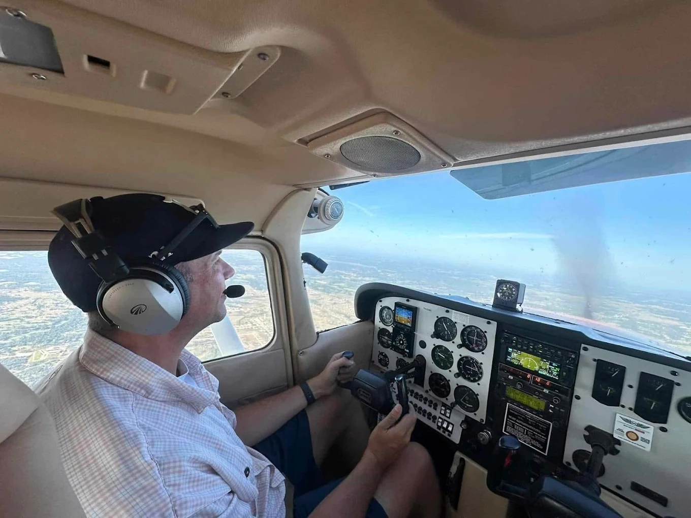Commercial pilot student training in the airplane cockpit