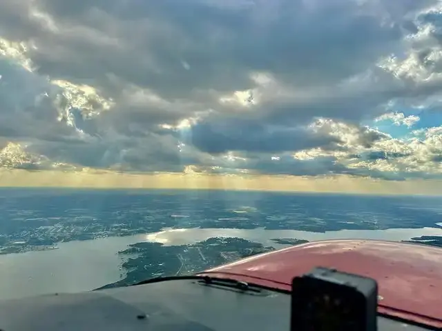 Business professional looking at an aviation map